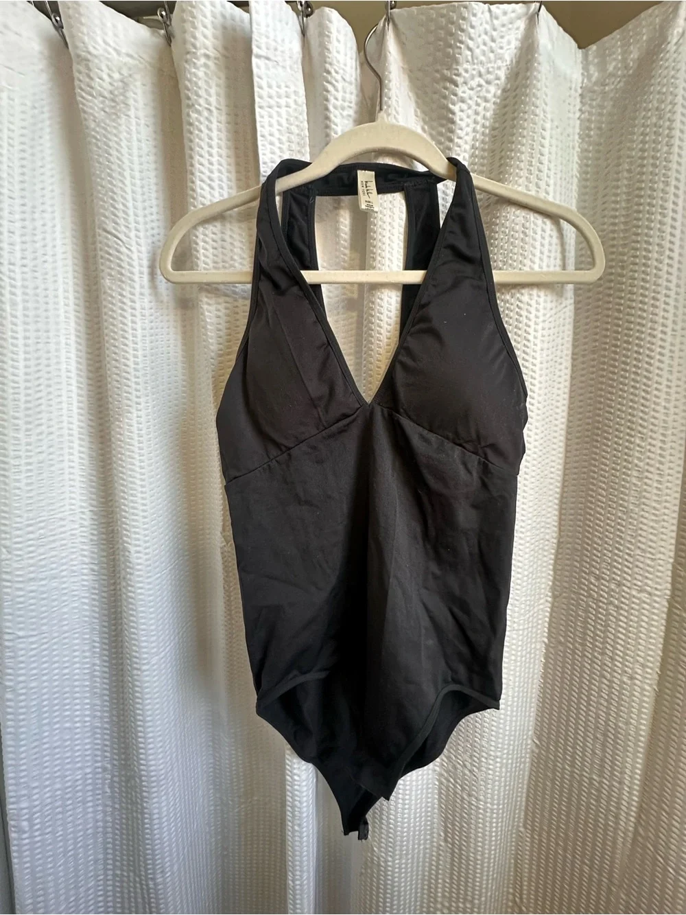 Nicole Miller Black Sleeveless Keyhole Back Body suit.